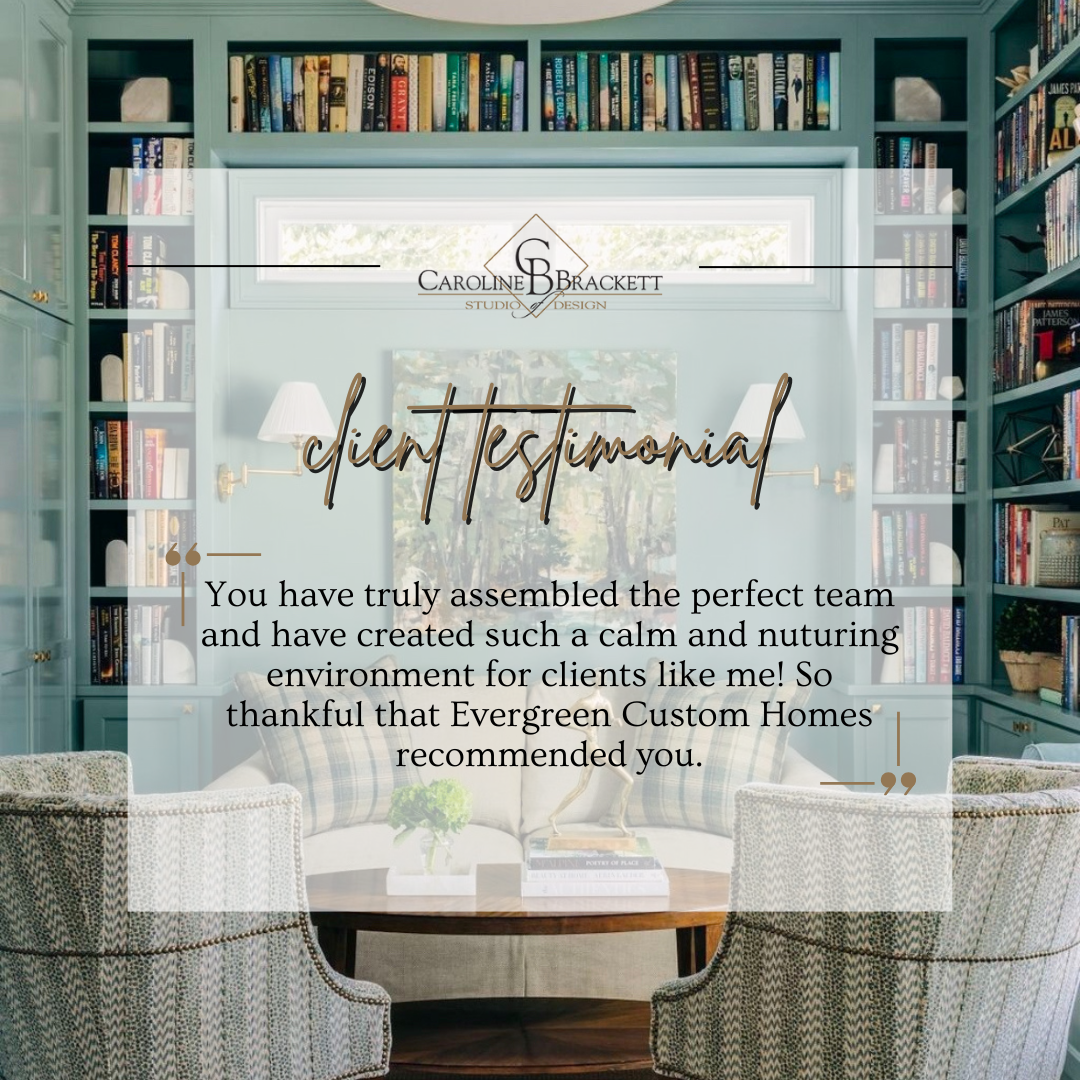 A cozy interior room with a large window, built-in bookshelves filled with books, a round wooden table with a small plant, and two upholstered chairs. Text overlay includes a logo for Caroline Brackett Studio of Design and a client testimonial.